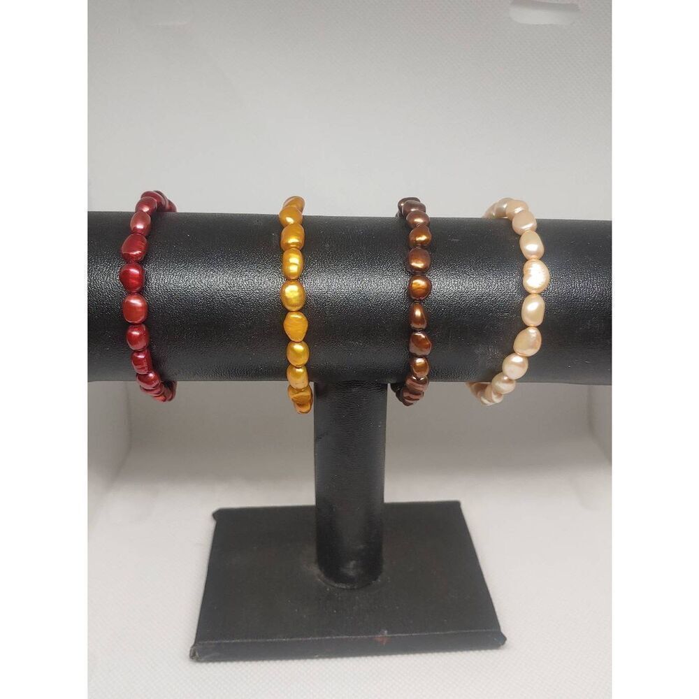 Set Of 4βWomen's Ivory/Gold/Brown/Maroon Beaded Elastic Band Bracelets